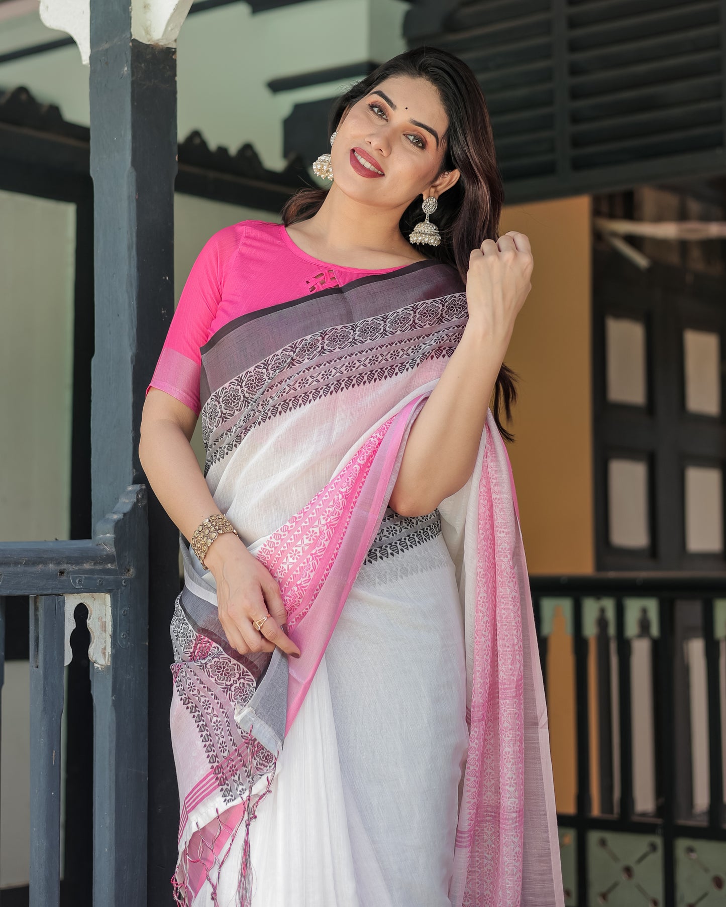 Exquisite Pink & White Linen Saree.
