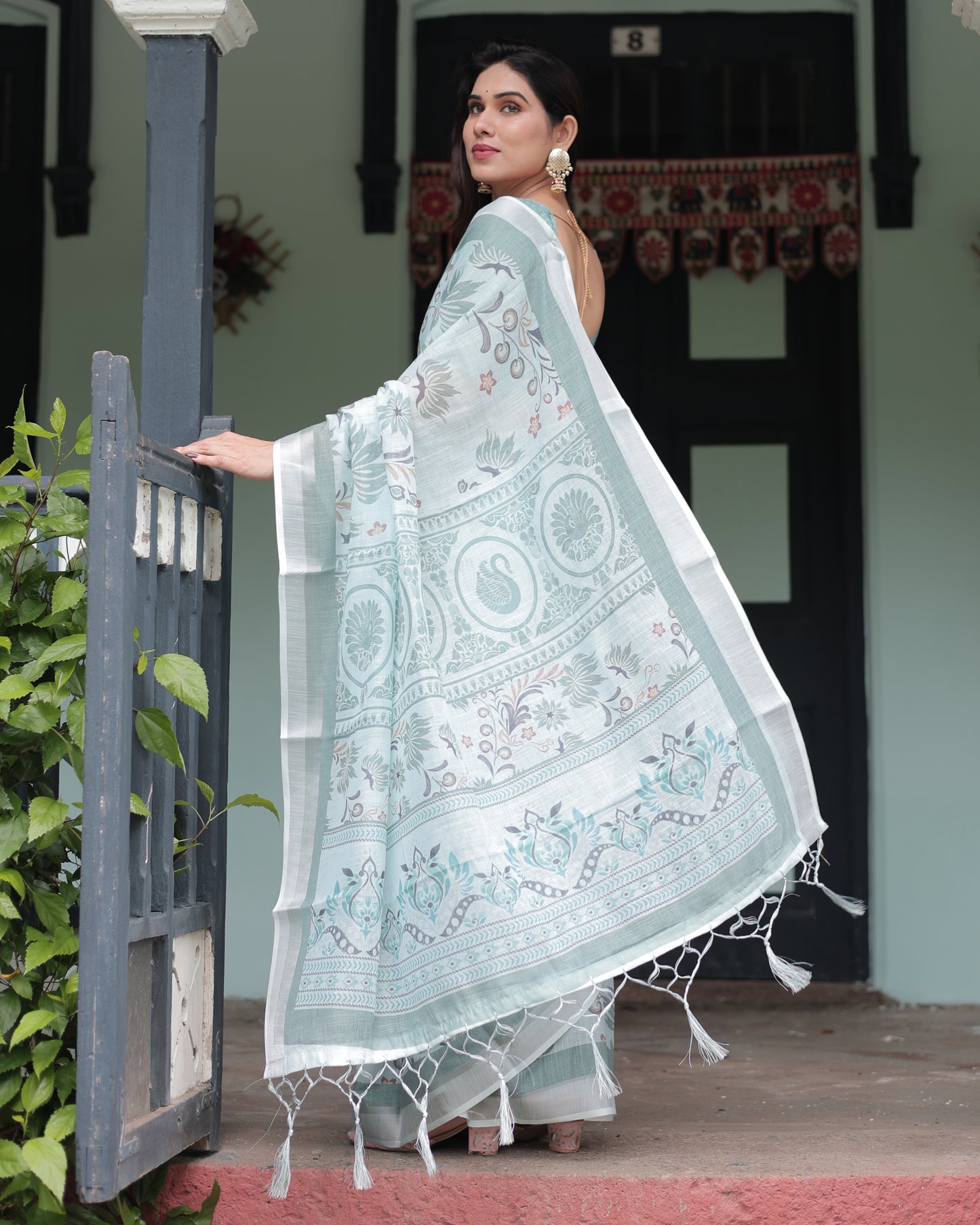 Misty Green Elegance Pure Linen Saree With Tassels.