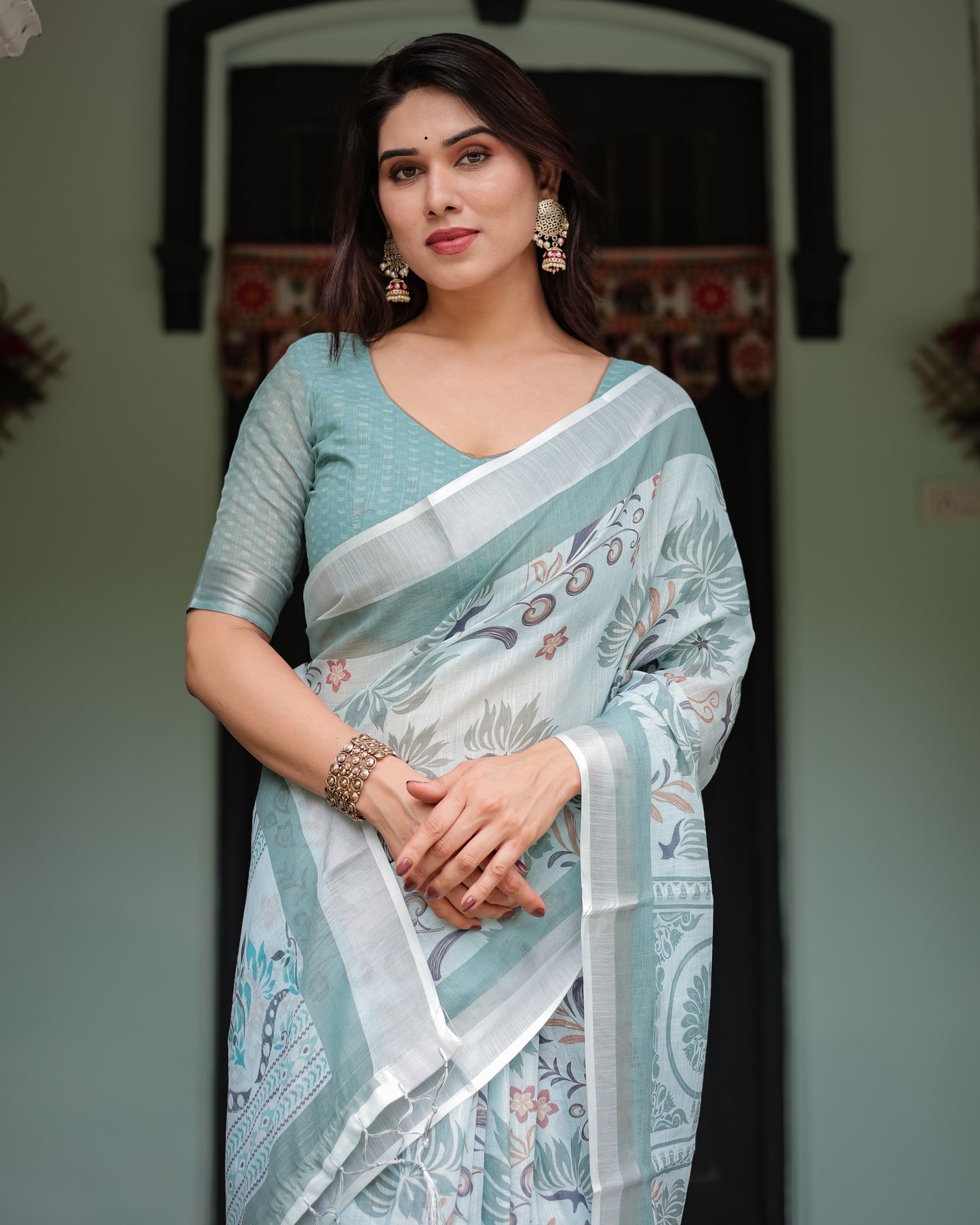 Misty Green Elegance Pure Linen Saree With Tassels.