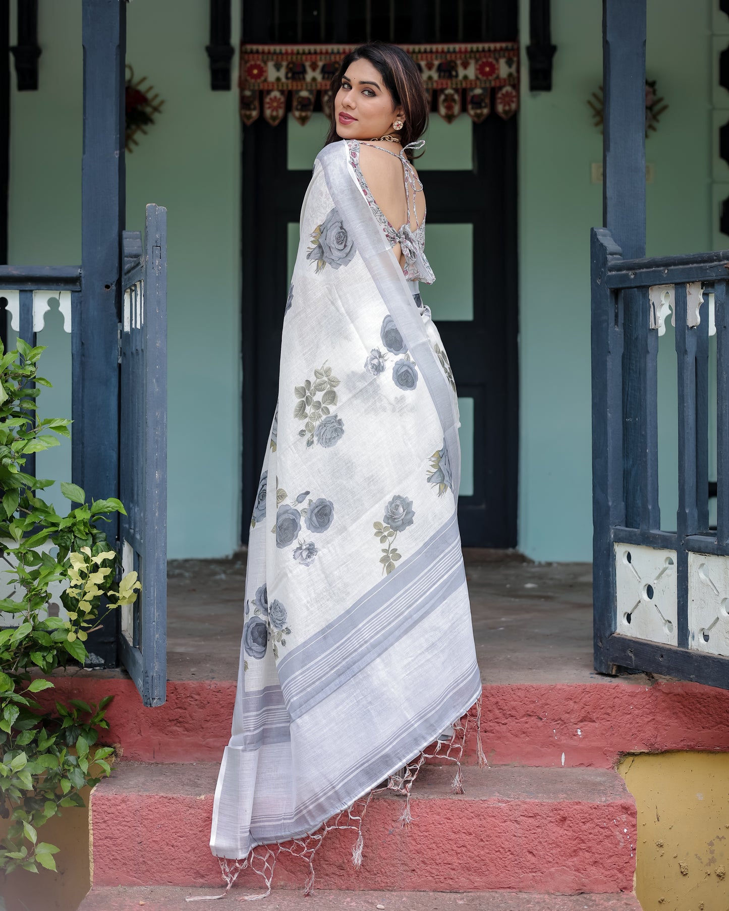 Elegance In White Pure Linen Saree with Tassels.