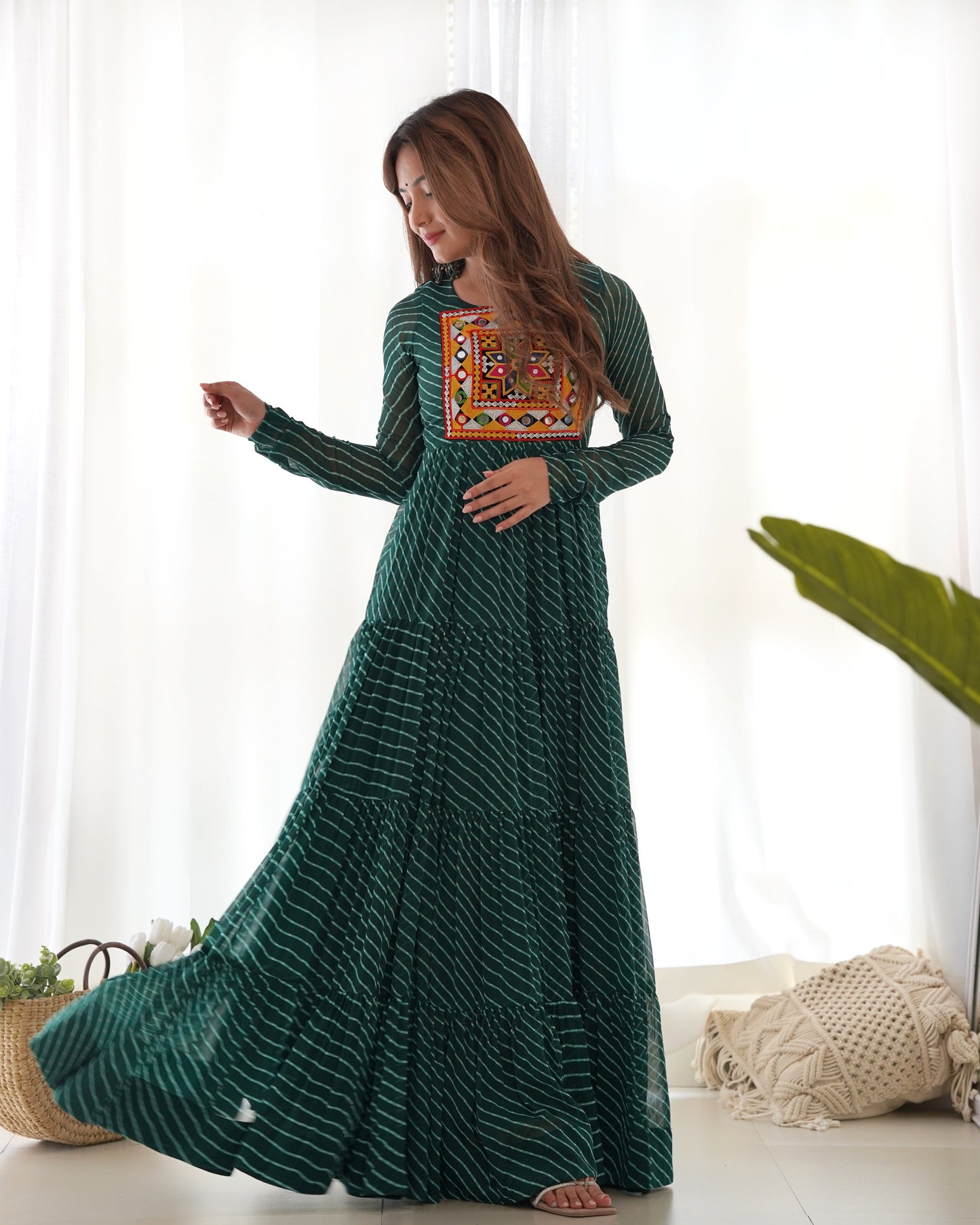 Navratri Season Special New Bottle Green Laheriya Print Gown Collection.