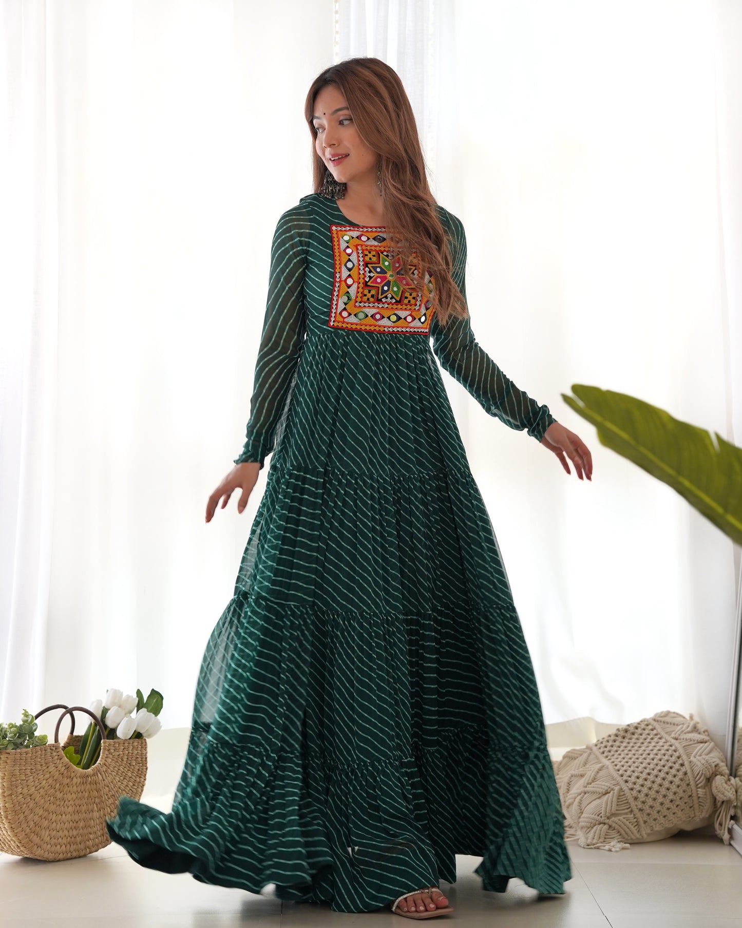 Navratri Season Special New Bottle Green Laheriya Print Gown Collection.