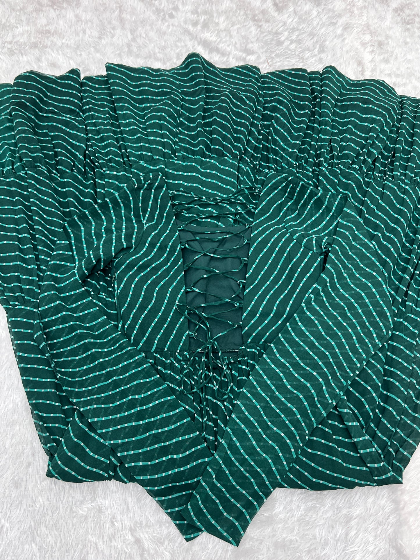 Navratri Season Special New Bottle Green Laheriya Print Gown Collection.