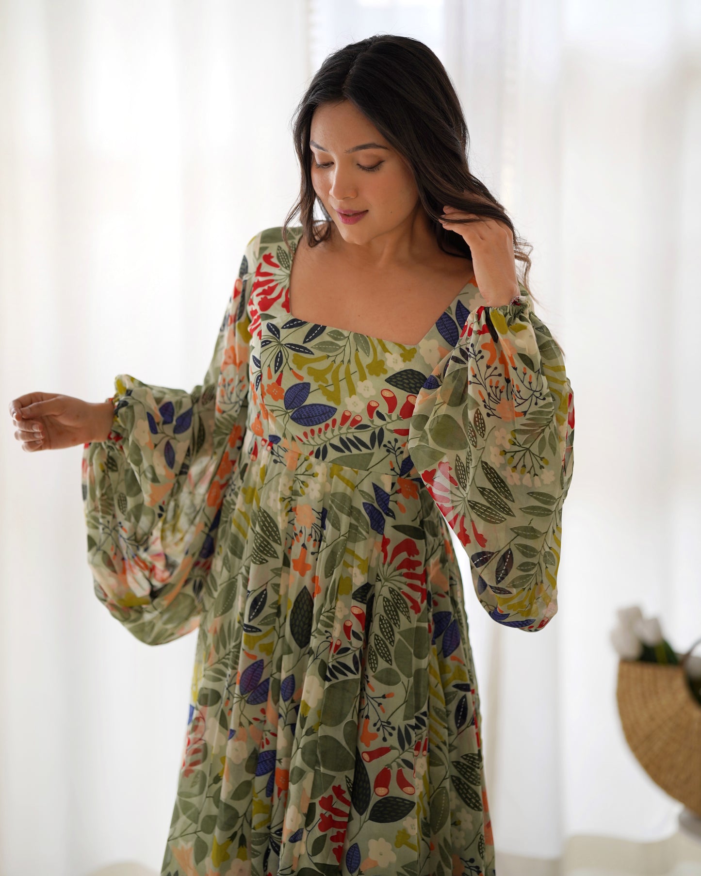 Pure Soft Faux Georgette Floral Printed Flaired Gown.
