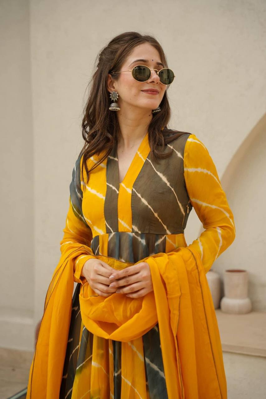 Haldi Functions Special Pretty Lehriya Printed Yellow Outfit.
