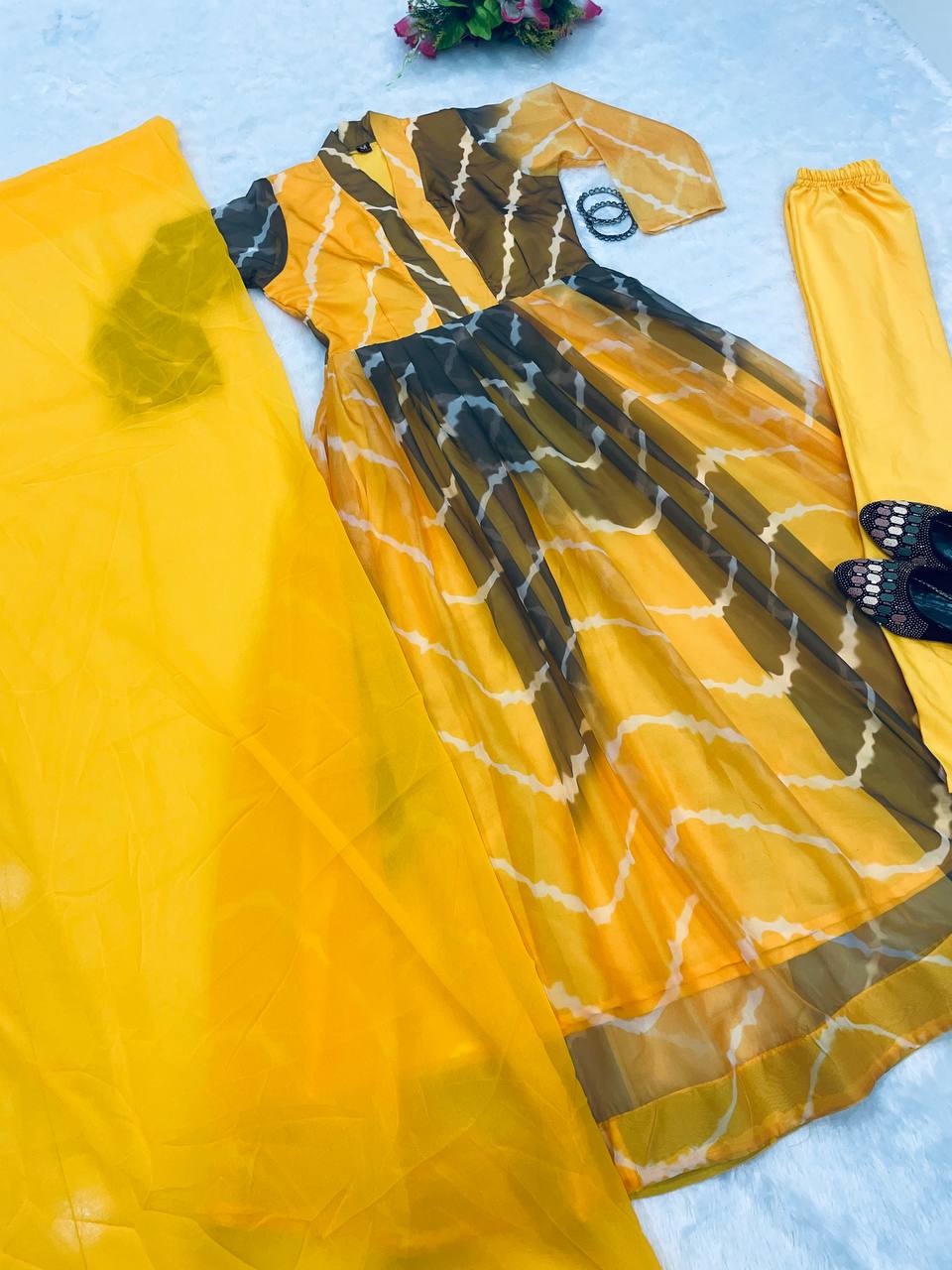 Haldi Functions Special Pretty Lehriya Printed Yellow Outfit.
