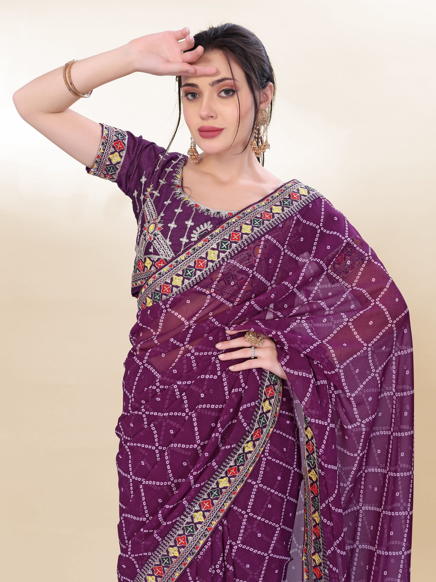 Latest Designer Traditional Wear Special Wine Bandhni Saree Collection.