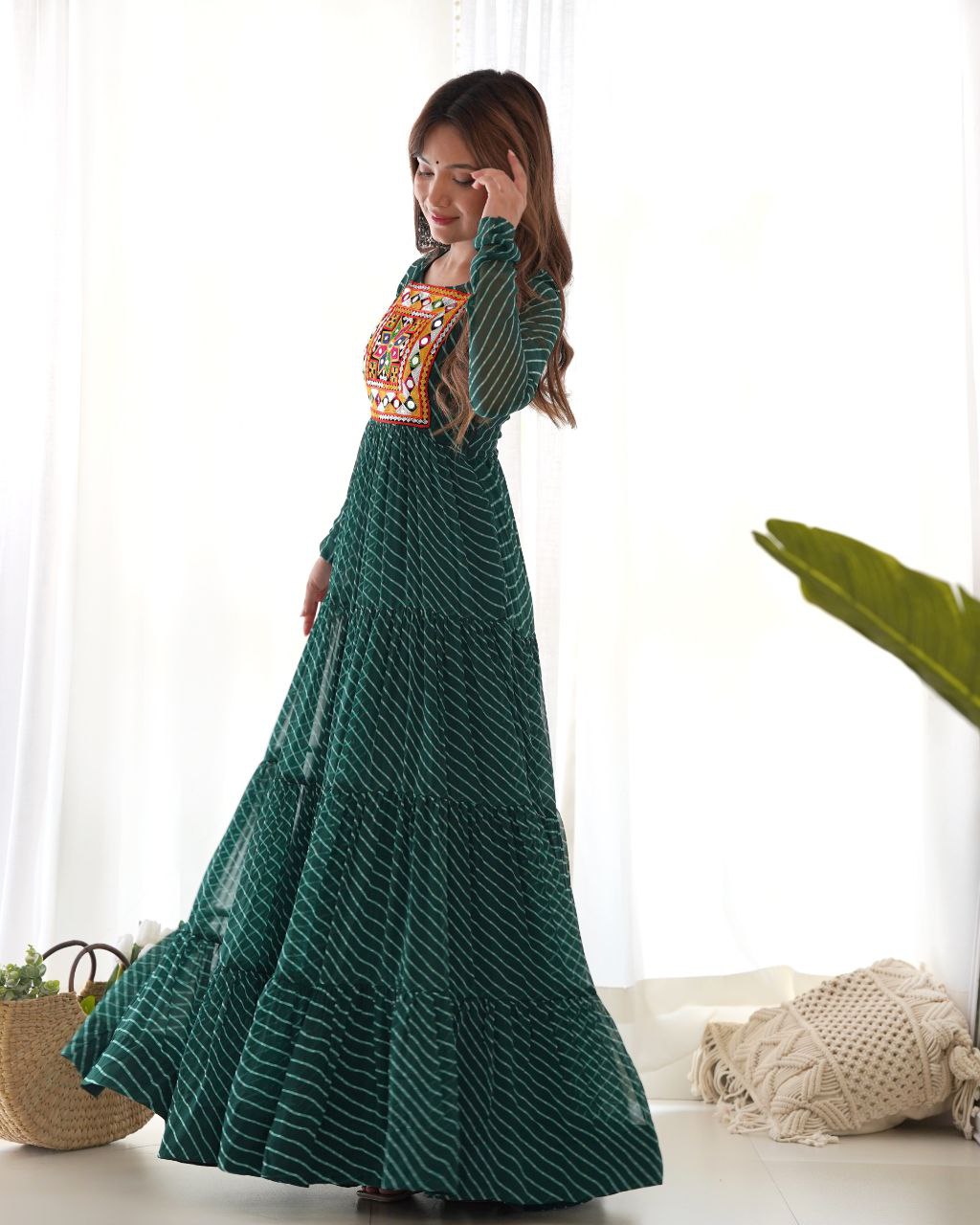 Navratri Season Special New Bottle Green Laheriya Print Gown Collection.