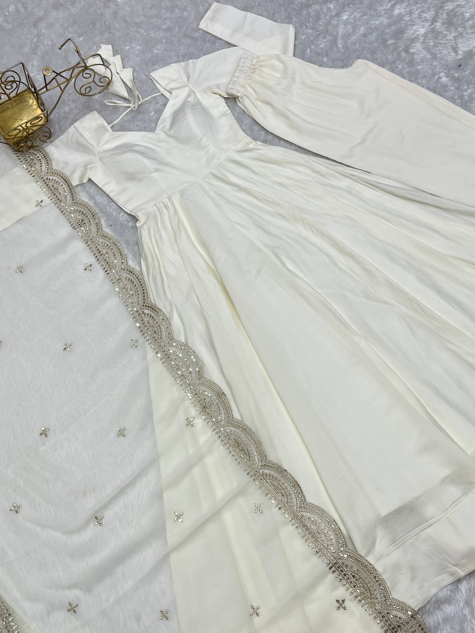 Offwhite Festival Season Special New Trendy Gown Collection.