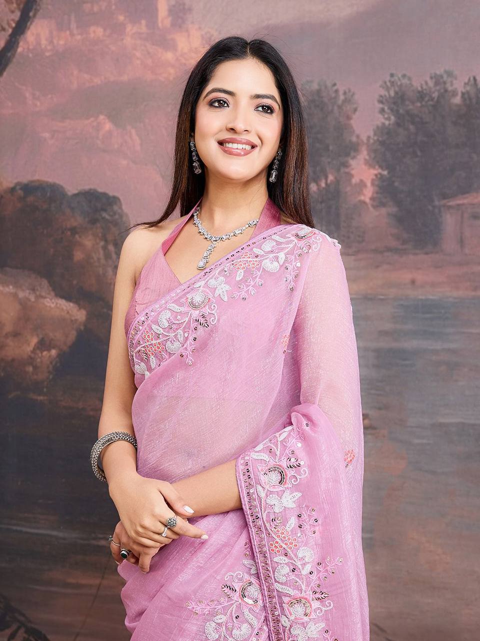 Pretty Rust Pink Crunchy Soft Organza Saree Collection.