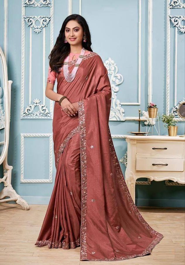 Amazing Pretty Look Orange Colour Vichitra Silk saree.