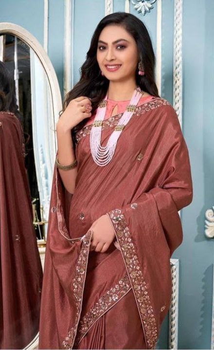 Amazing Pretty Look Orange Colour Vichitra Silk saree.