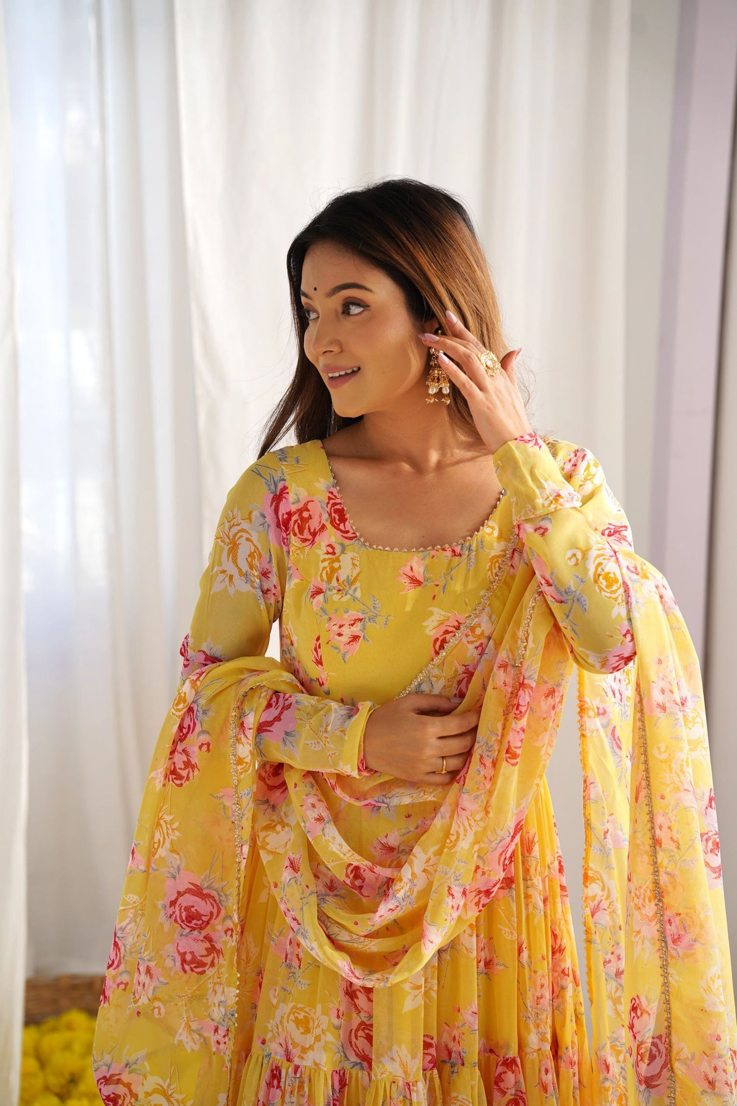 Yellow Colour Floral Printed Haldi functions Special Full Flaired Gown Collection.