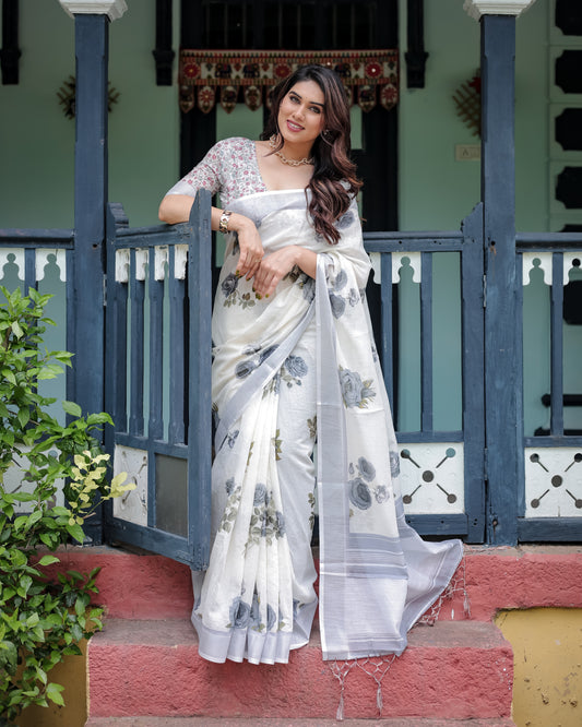Elegance In White Pure Linen Saree with Tassels.