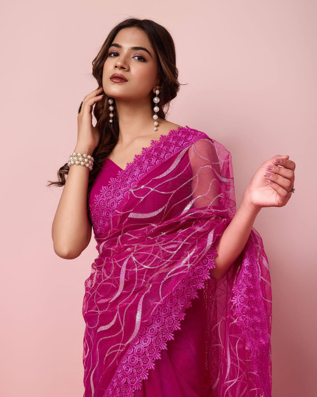 Beautiful Pink Colour Soft Net Sarees.