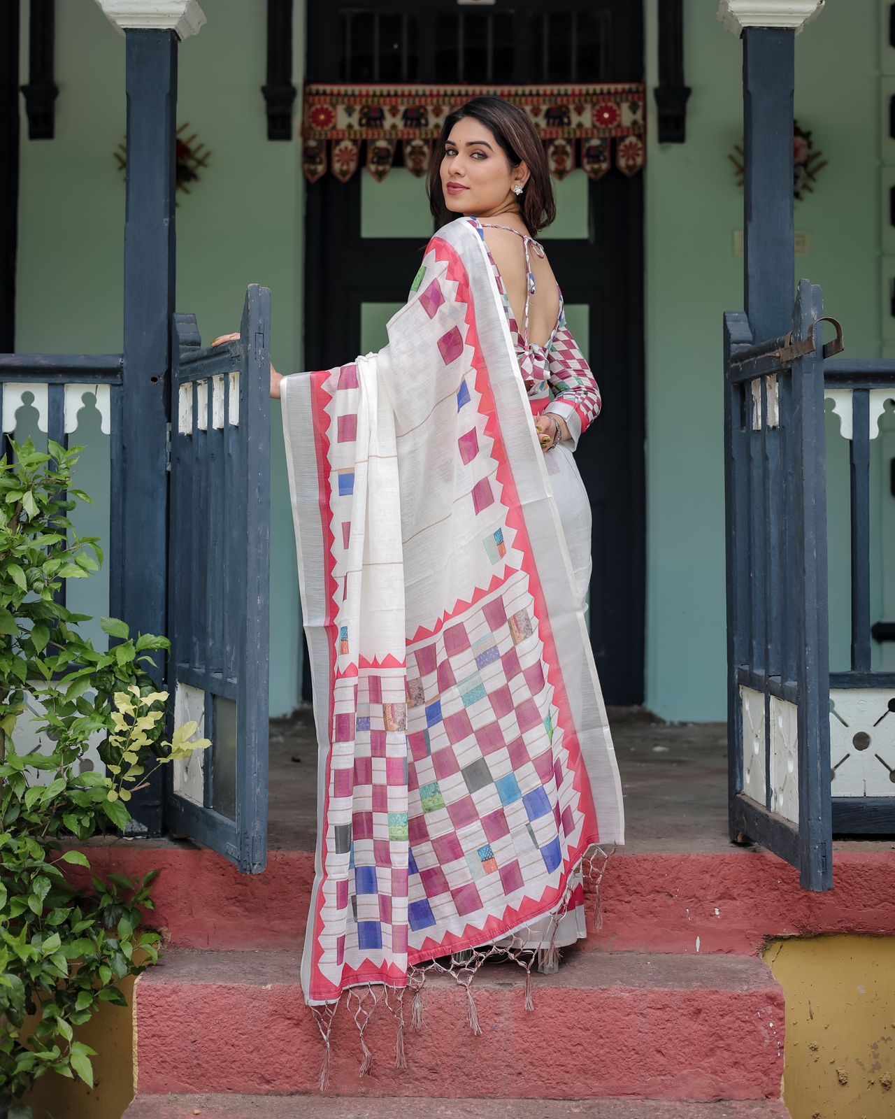 Classic White Pure Linen Saree With Tassels Collection.