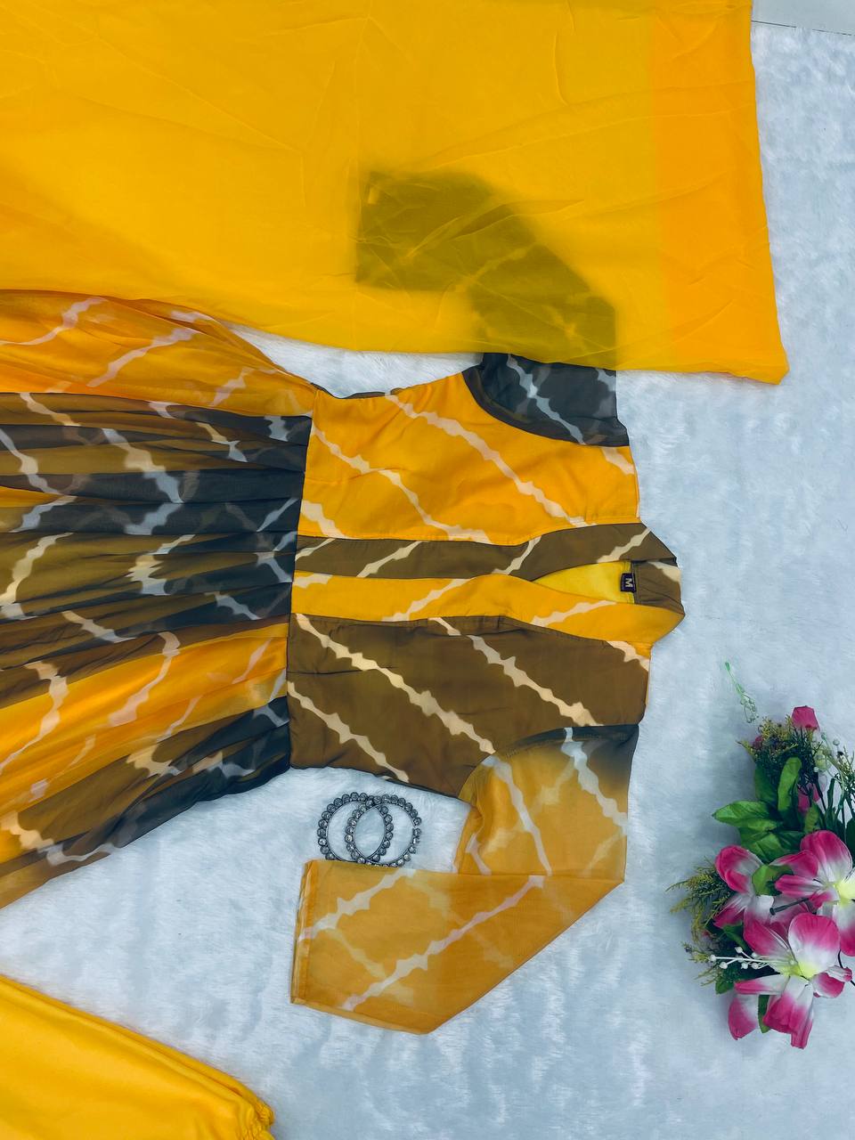 Haldi Functions Special Pretty Lehriya Printed Yellow Outfit.
