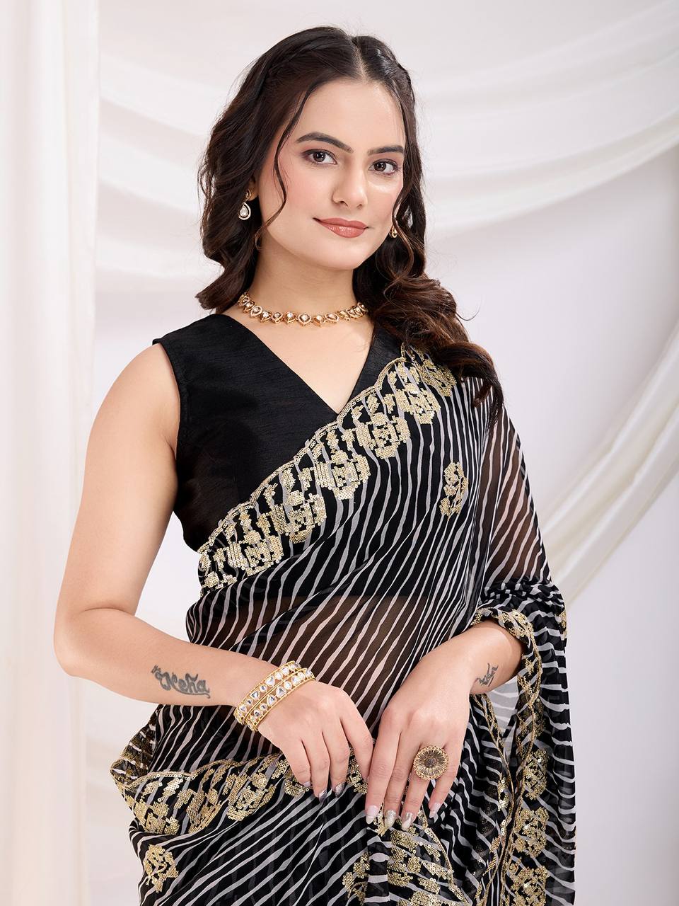 Party Wear Black Georgette Saree Collection.