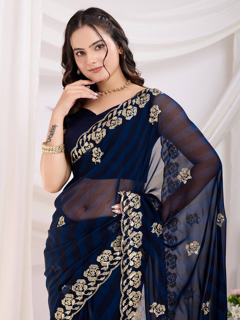 Adorable Designer Blue Georgette Saree Collection.