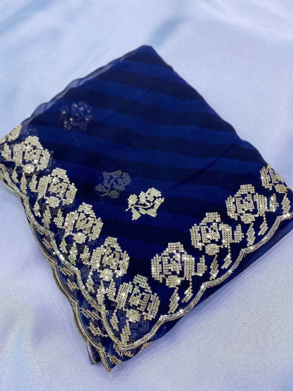 Adorable Designer Blue Georgette Saree Collection.