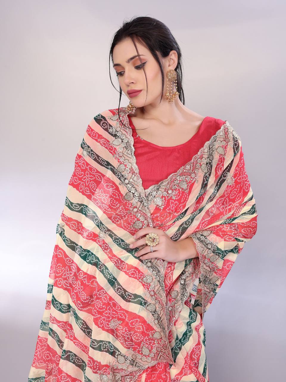 Pretty Designer Leriya Bandhani Printed Saree Collection.