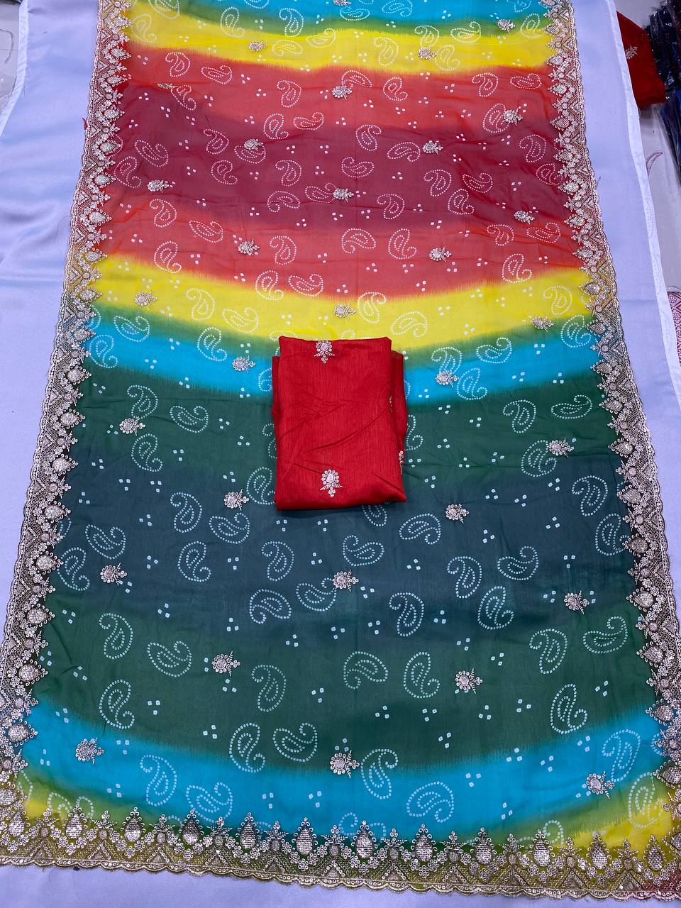 Gorgeous Designer New Multi Colored Bandhani Printed Saree Collection.