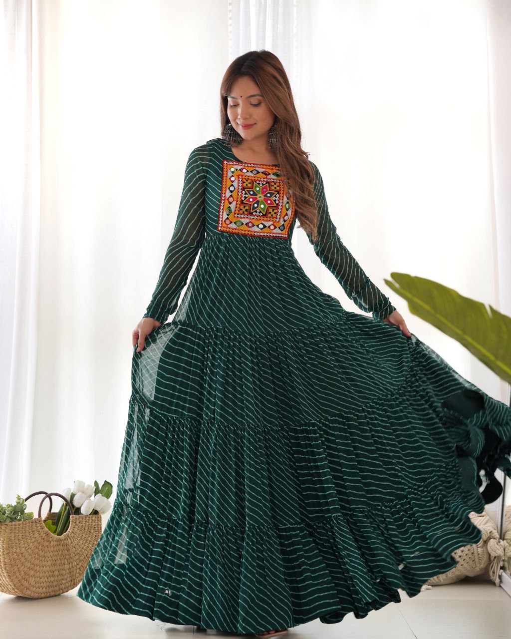 Navratri Season Special New Bottle Green Laheriya Print Gown Collection.