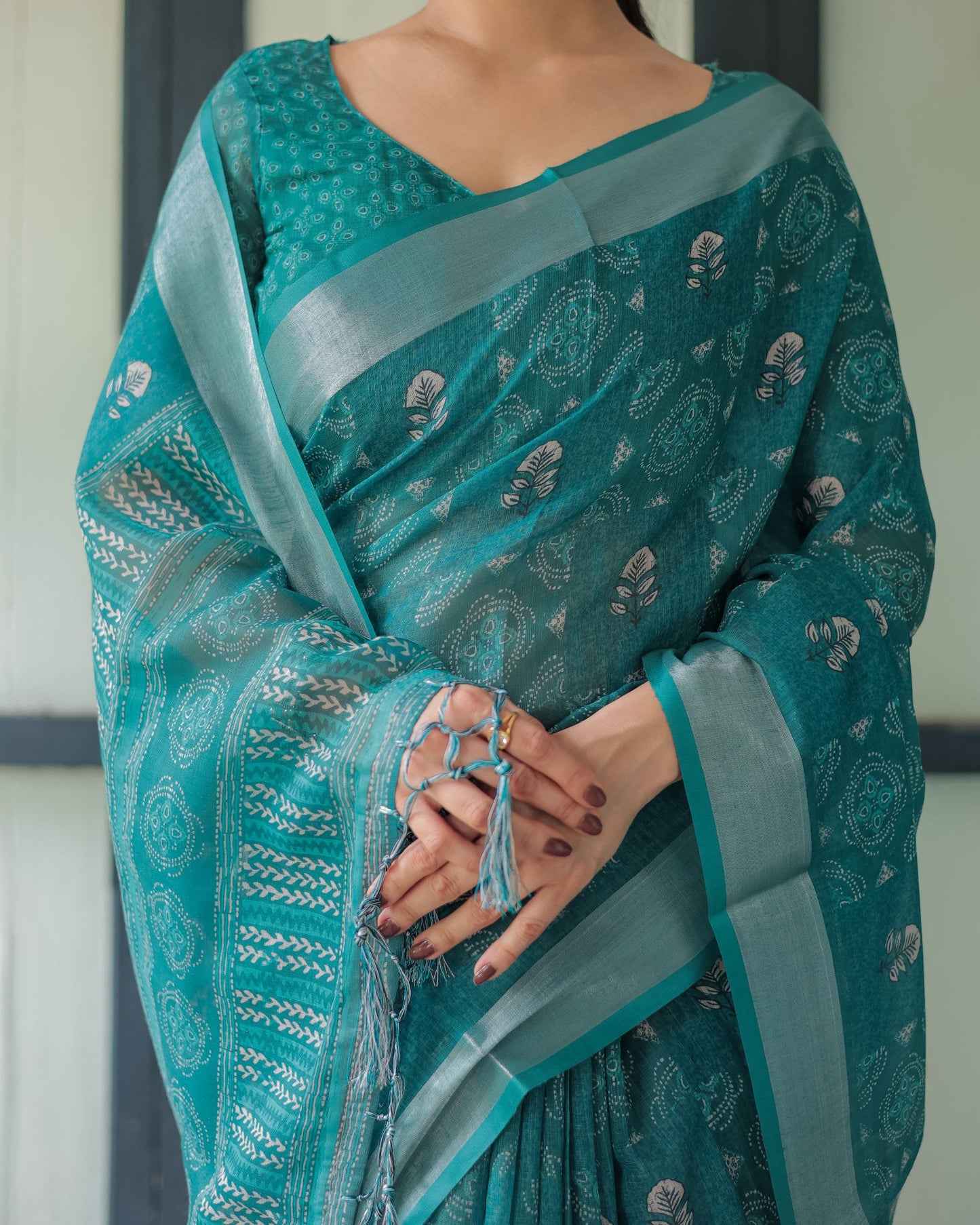 Graceful Teal Bandhani Linen Saree.