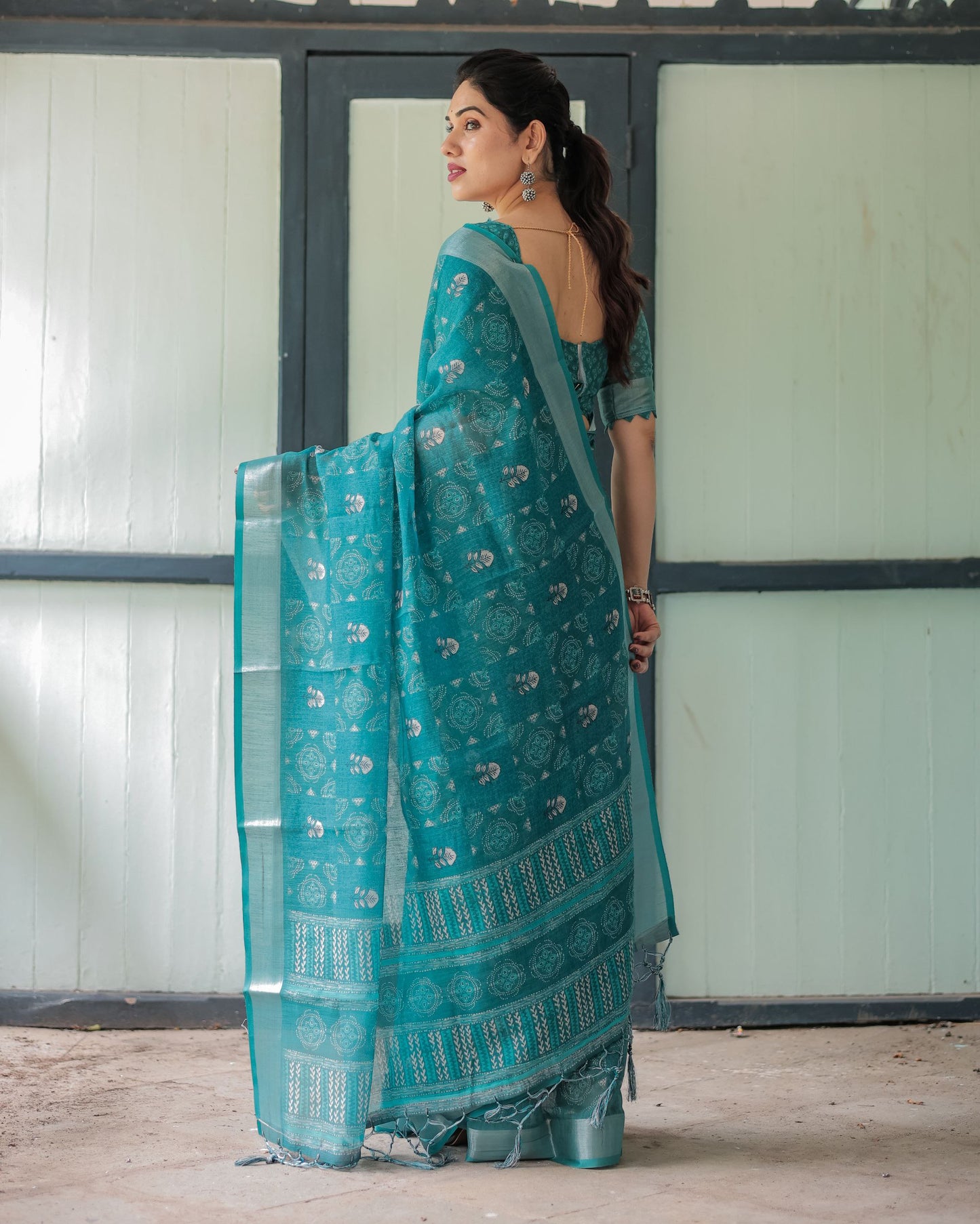 Graceful Teal Bandhani Linen Saree.
