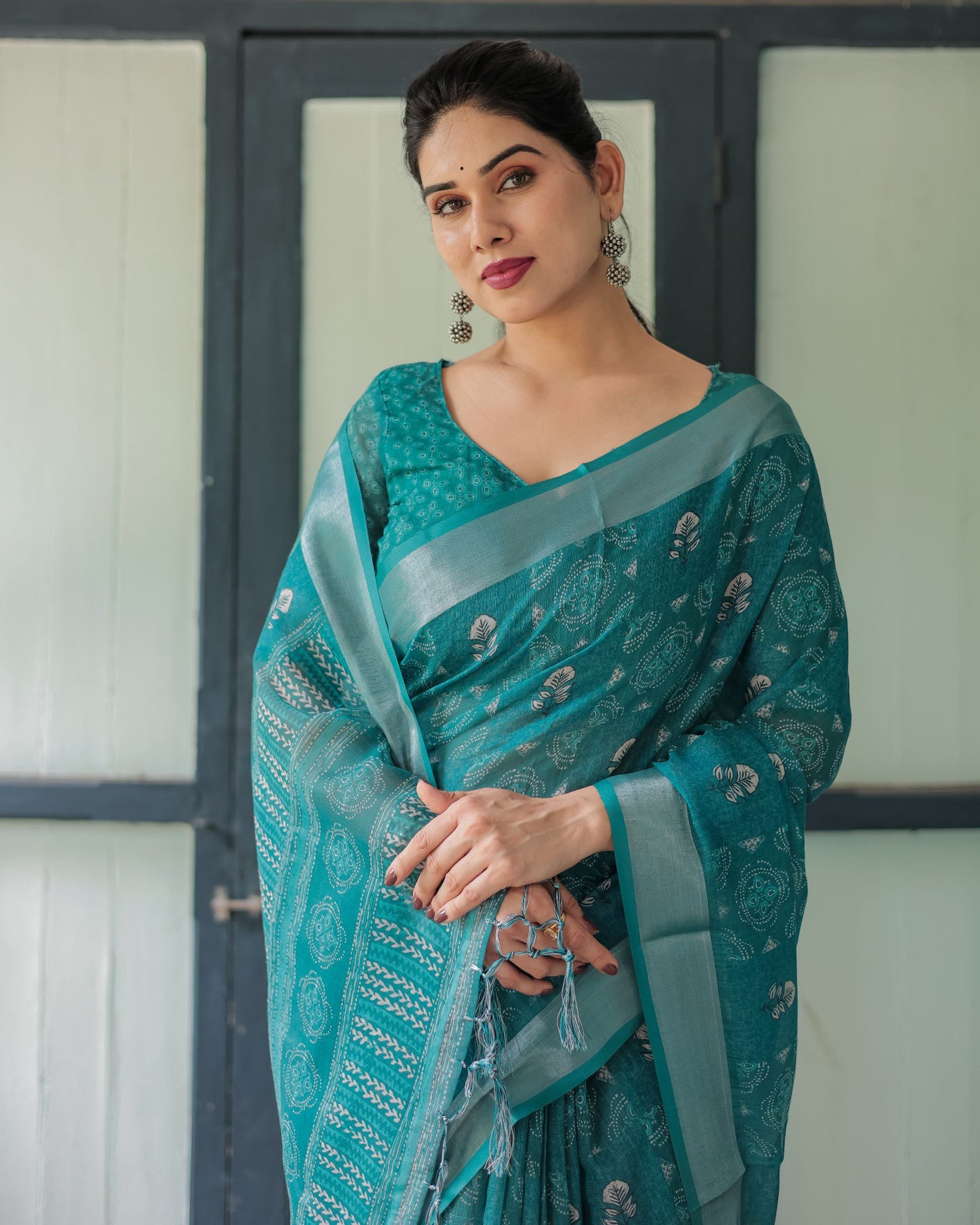 Graceful Teal Bandhani Linen Saree.