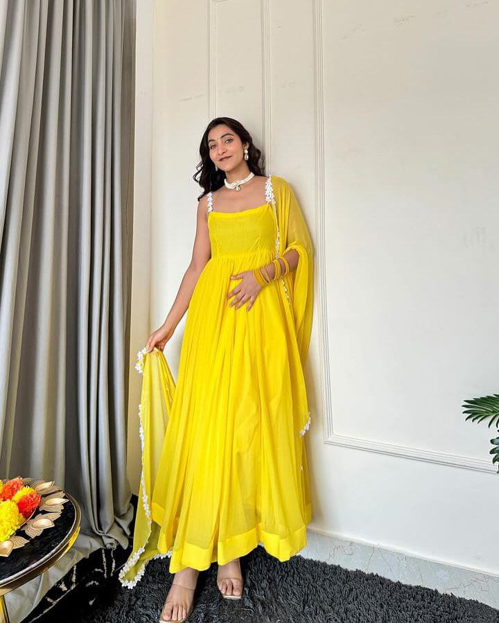 Pretty Haldi Ceremony Special Yellow Gown Collection.