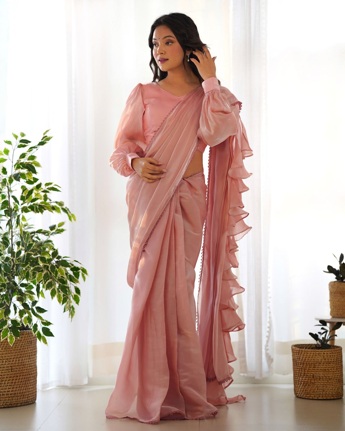 Pretty Peach Colour Party Wear Predrapped Ruffle Ready To Wear Saree Collection.