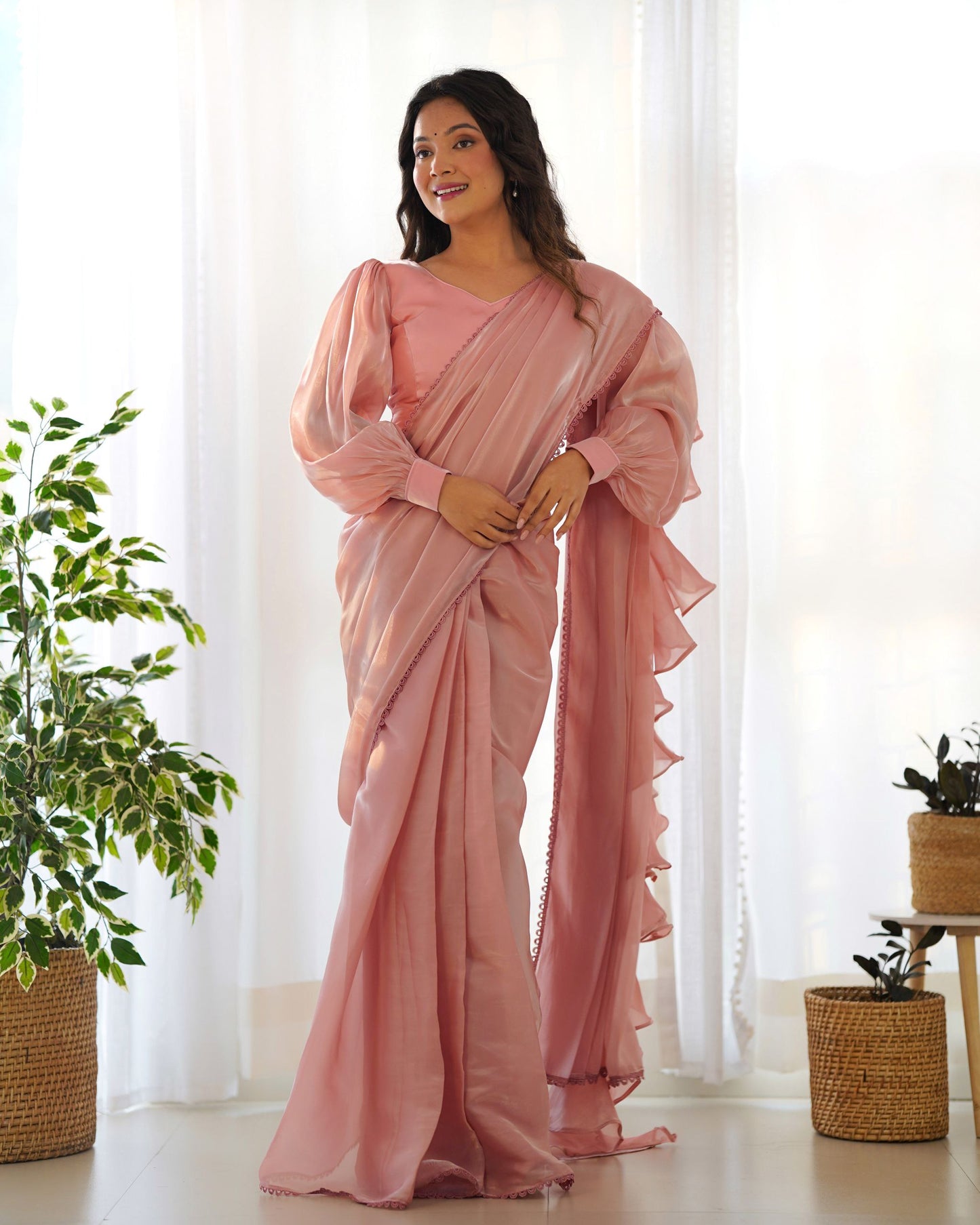Pretty Peach Colour Party Wear Predrapped Ruffle Ready To Wear Saree Collection.