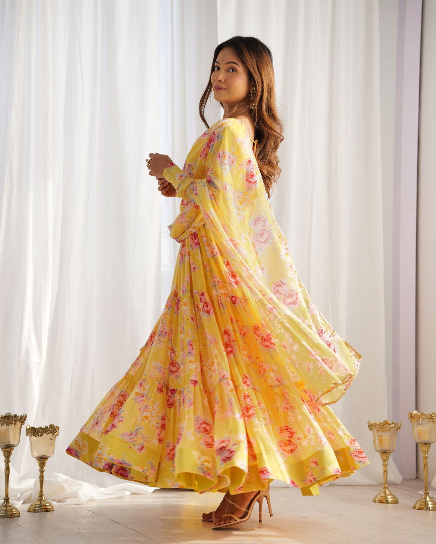 Yellow Colour Floral Printed Haldi functions Special Full Flaired Gown Collection.