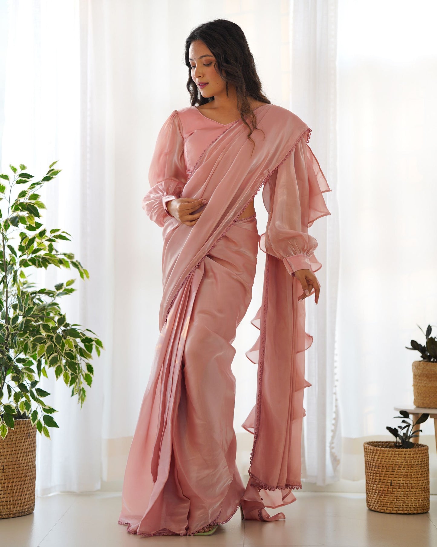 Pretty Peach Colour Party Wear Predrapped Ruffle Ready To Wear Saree Collection.