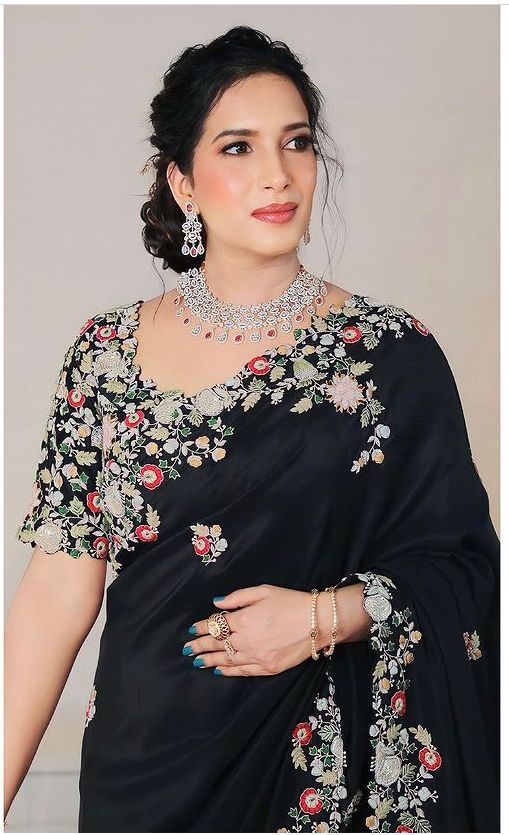 Party Wear Soft Georgette Black Saree Collection.