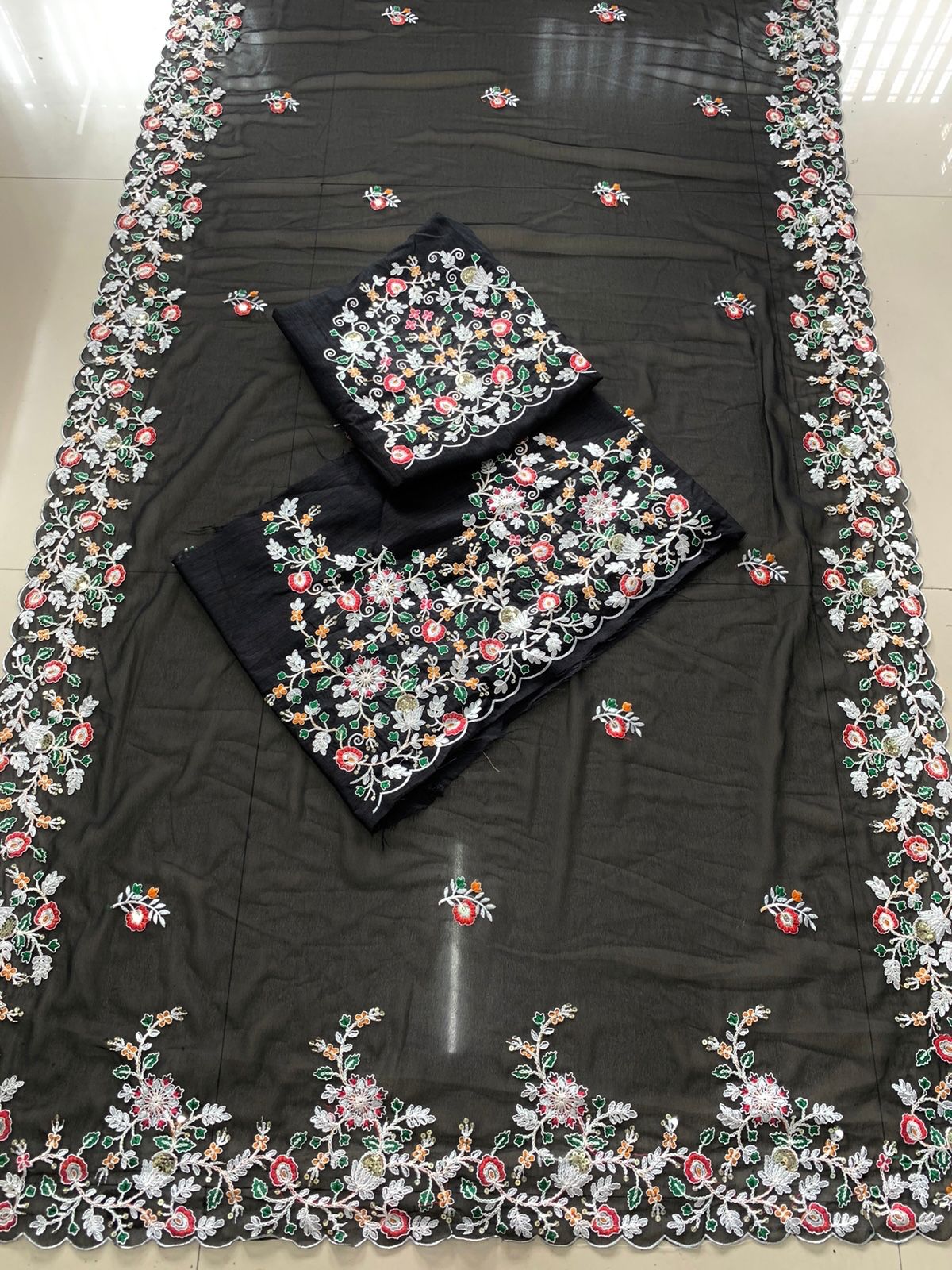 Party Wear Soft Georgette Black Saree Collection.